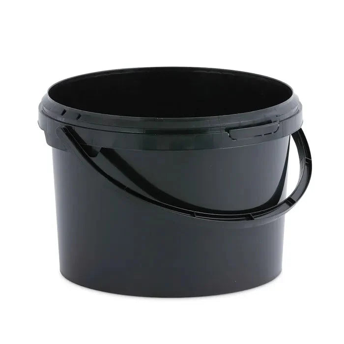 Black plastic bucket on a white background
