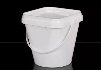 White plastic bucket on a black background